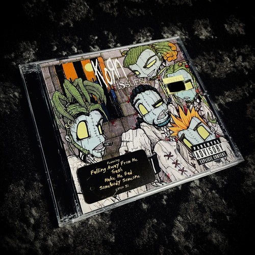 Korn issues cd - korn,